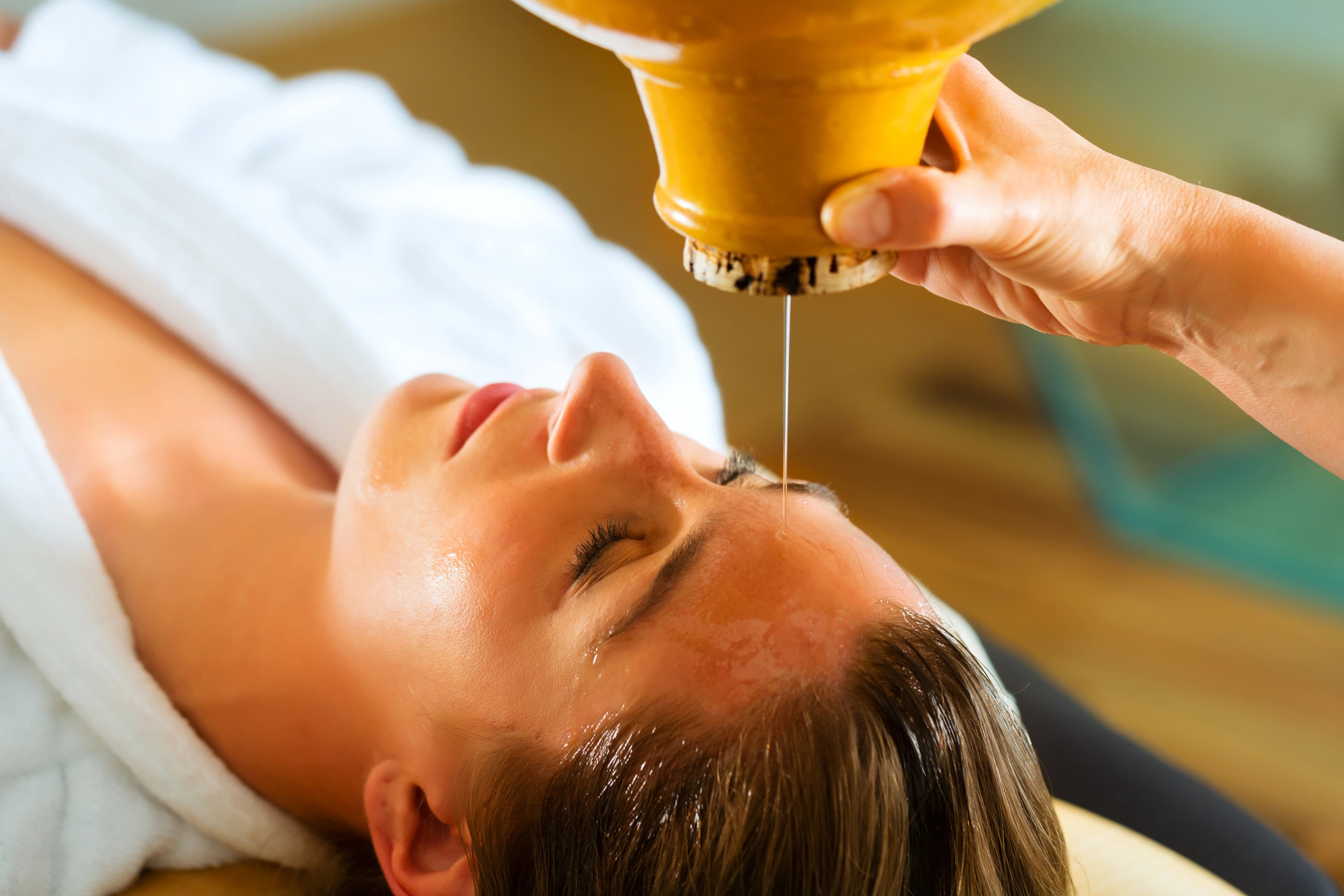 Traditional Ayurvedic oil therapy